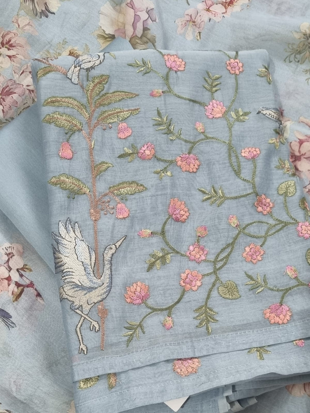 Machine embroidered powder blue suit – close-up of embroidery detail