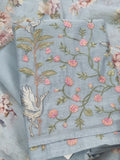 Machine embroidered powder blue suit – close-up of embroidery detail