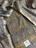 Khaki Ajrakh cotton hakoba kurta fabric with gold paisley embroidery and Chanderi silk dupatta with zari border, flat lay detail