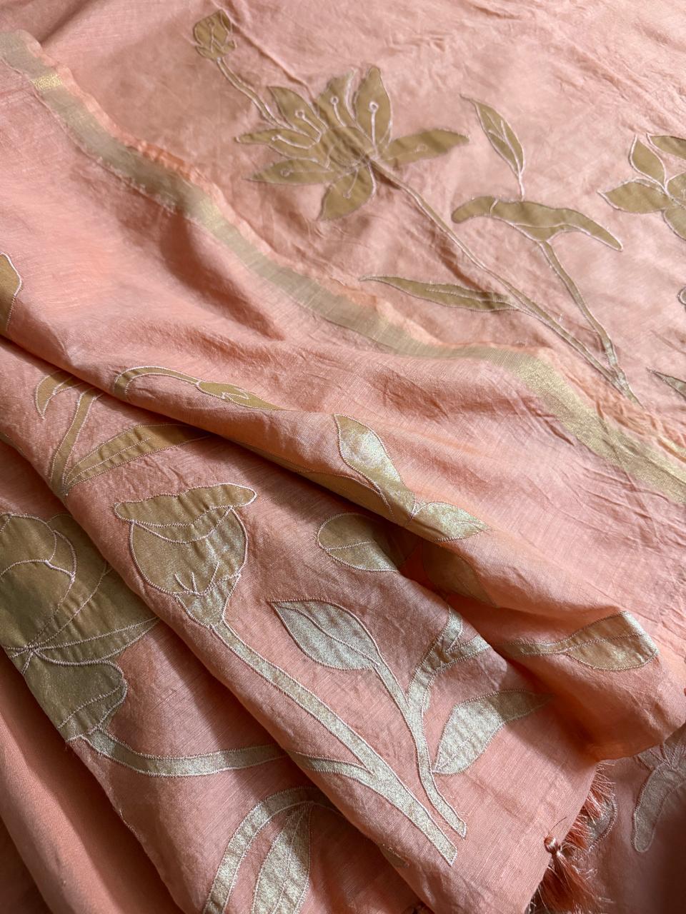 Peach beige Chanderi silk kurta fabric with gold silk tissue appliqué tulip, lotus bud and leaf motifs in close detail