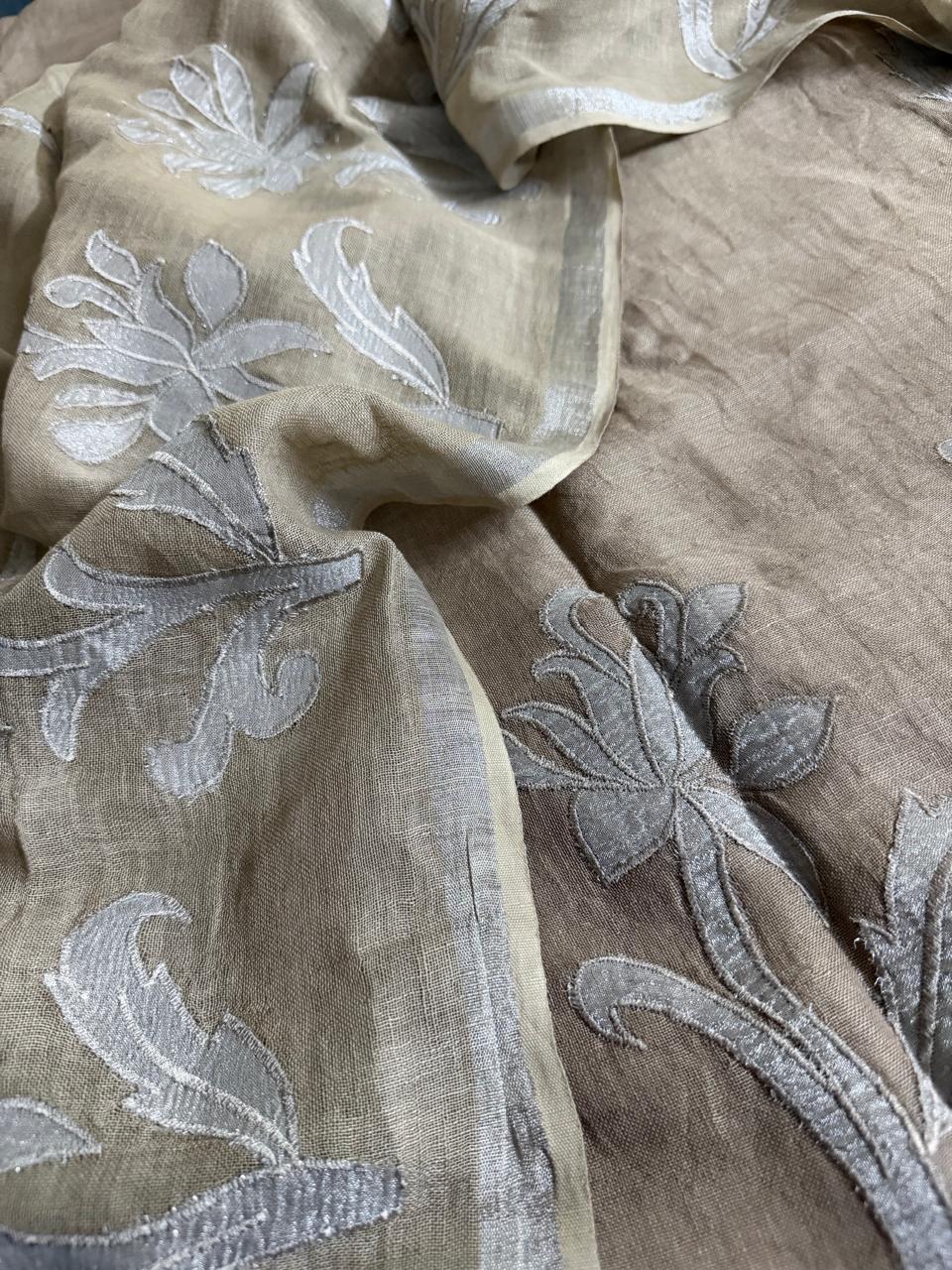 Close-up of taupe linen dupatta with Silver silk tissue appliqué floral and leaf border embroidery detail