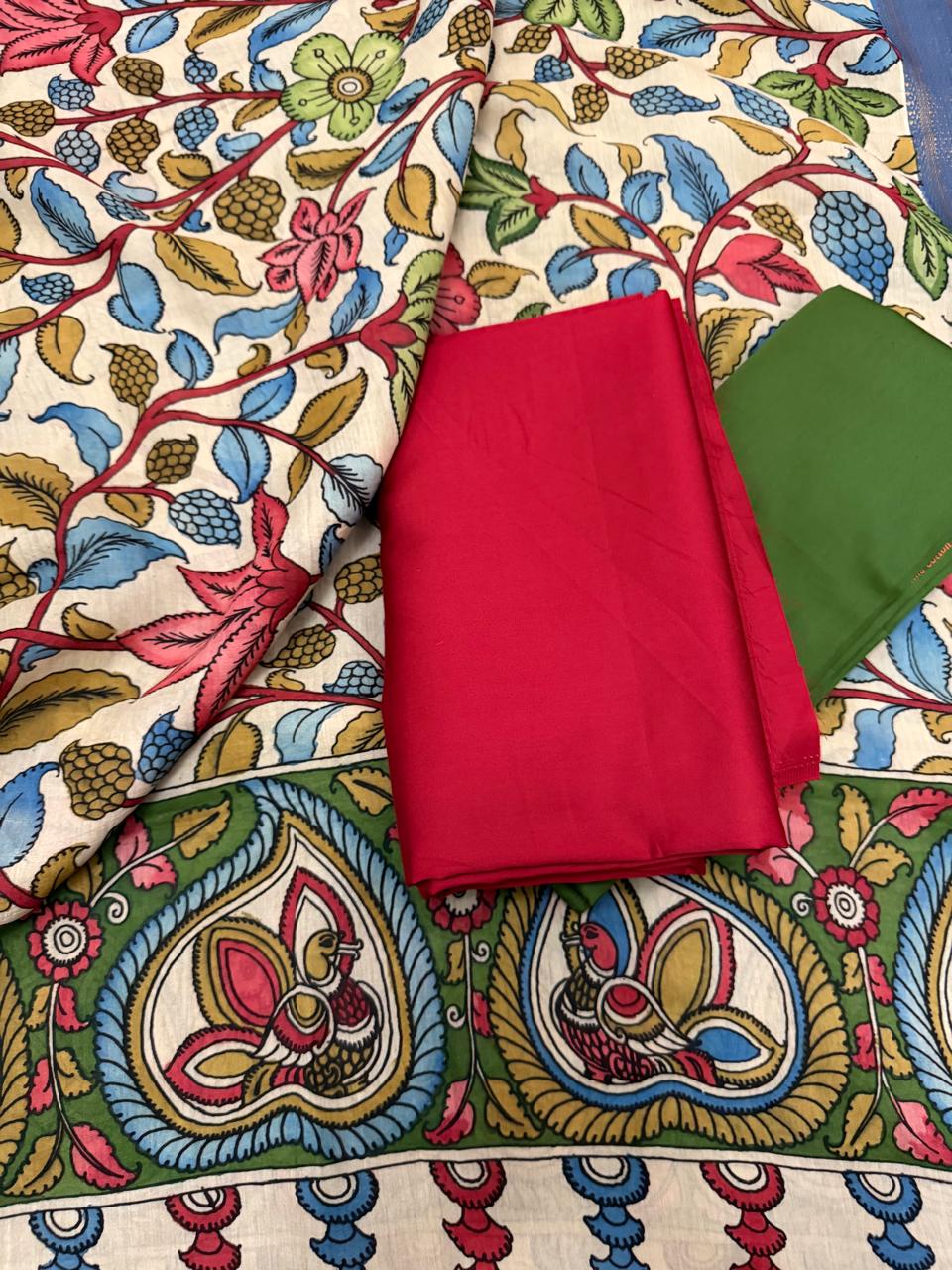 "Pen Kalamkari Mangalgiri silk dupatta with crimson red cotton silk kurta fabric – 3-piece unstitched suit set flat lay, House of Tantuvana"