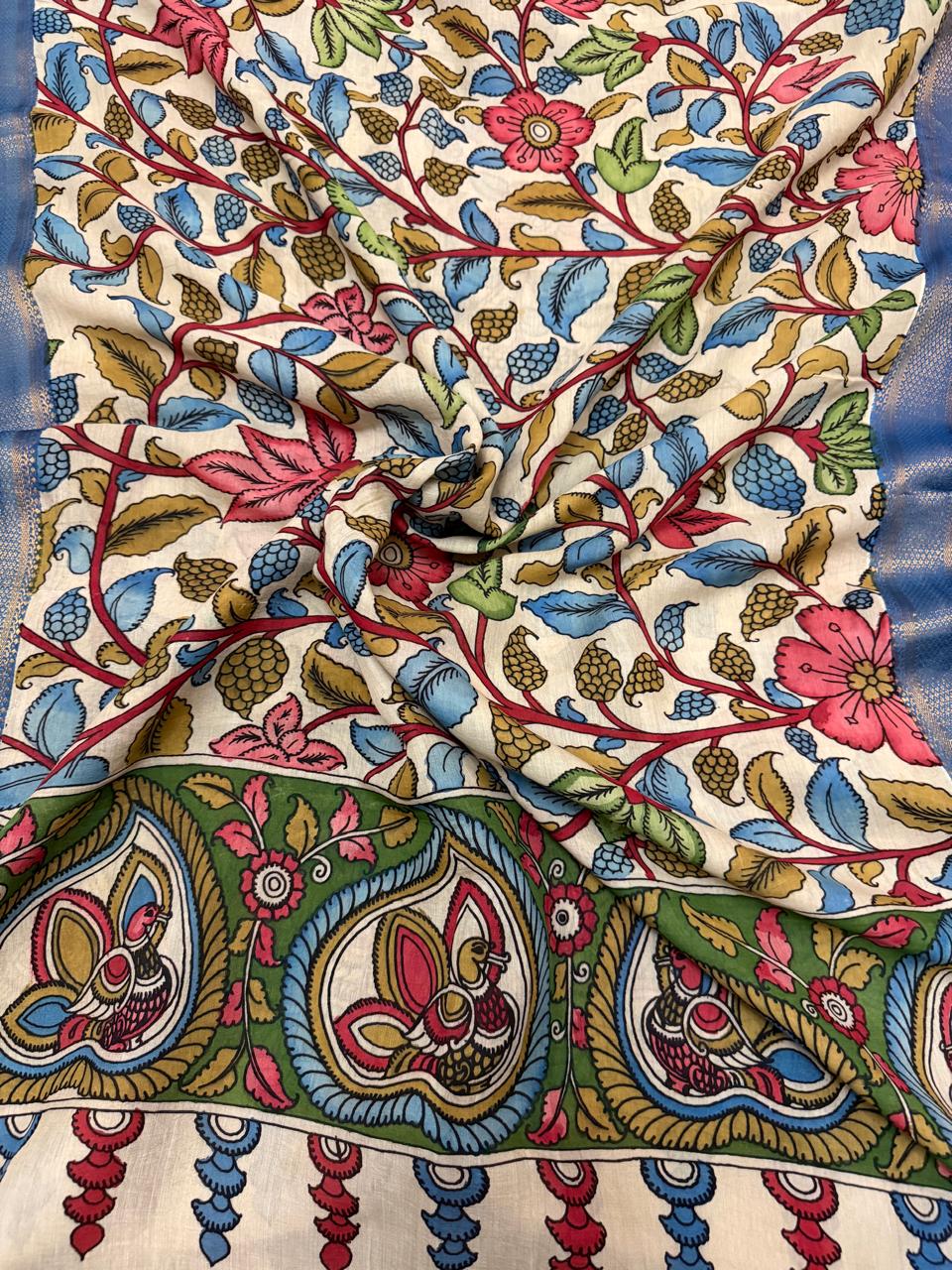 Draped Pen Kalamkari dupatta showing texture and drape – hand-painted ivory Mangalgiri silk with multicolour floral body and peacock-motif pallu border