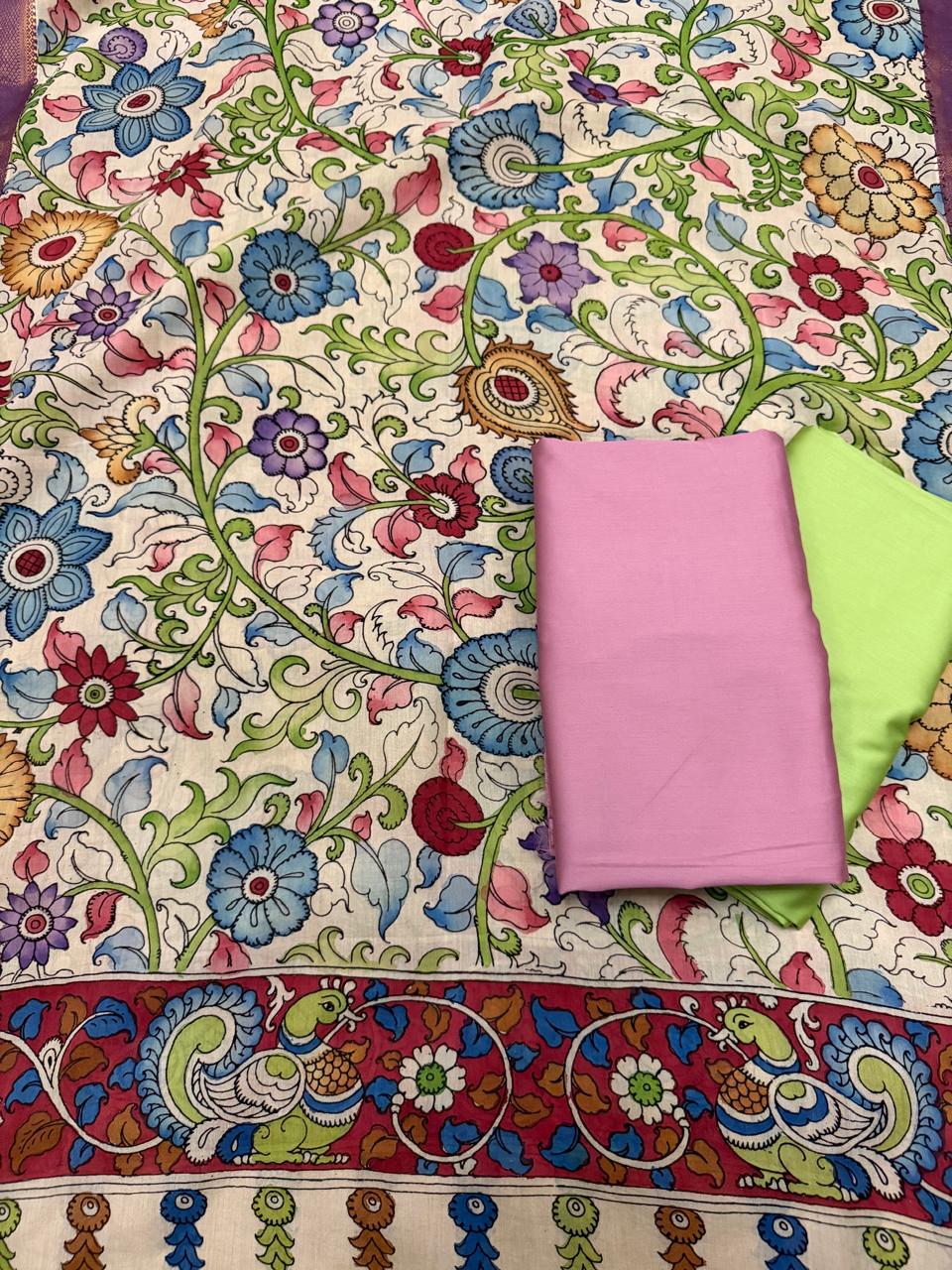 Unstitched 3-piece suit set flat lay – hand pen Kalamkari ivory dupatta with multicolour floral body, rose pink top fabric and lime green bottom, Mangalgiri silk
