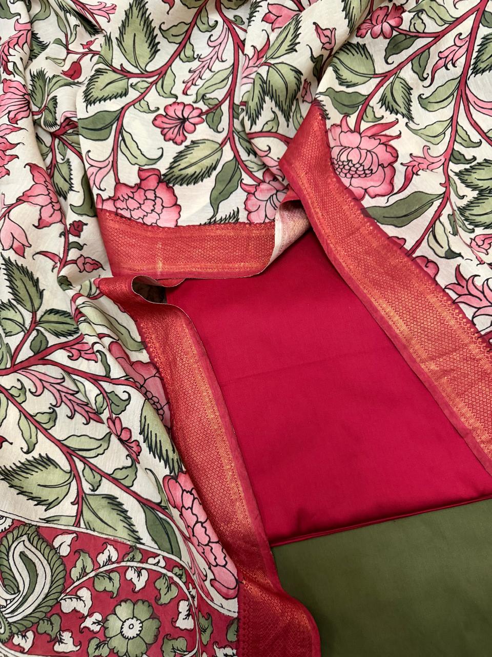 Hand pen Kalamkari dupatta with red and forest green cotton silk 3-piece unstitched suit set – flat lay overview, ivory floral vine body with peacock border, House of Tantuvana