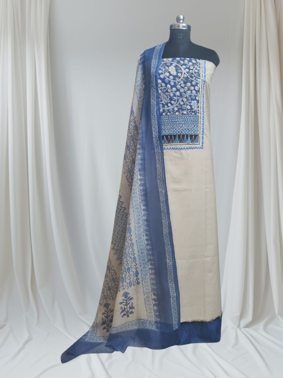 3-piece unstitched suit set in Taupe with blue neckline patch and block printed Kota Doria dupatta