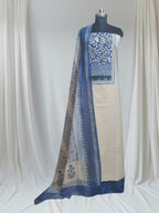 3-piece unstitched suit set in Taupe with blue neckline patch and block printed Kota Doria dupatta