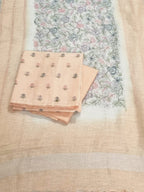 Light apricot linen unstitched suit set – front flat lay with embroidery detail