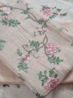 Machine embroidered Peach suit – close-up of embroidery detail