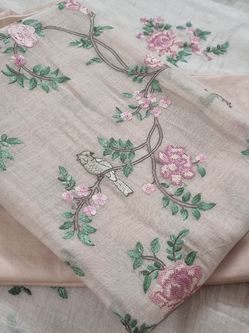 Machine embroidered Peach suit – close-up of embroidery detail