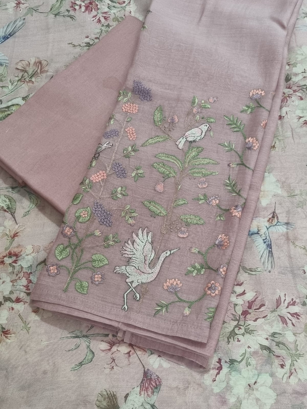Machine embroidered dusky pink suit – close-up of embroidery detail