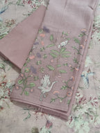 Machine embroidered dusky pink suit – close-up of embroidery detail