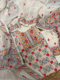Cream cotton unstitched kurta with multicolour Kantha hand embroidery – neckline panel, spiral body motifs and floral dupatta, 3-piece suit set flatlay