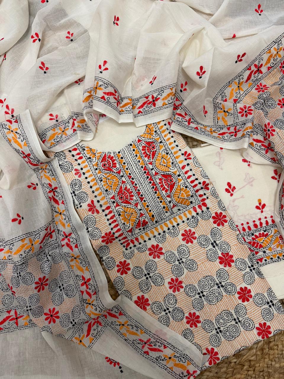 Cream cotton unstitched kurta with multicolour Kantha hand embroidery – neckline panel, spiral body motifs and floral dupatta, 3-piece suit set flatlay