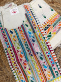 Angled flatlay of white cotton Kantha hand-embroidered unstitched co-ord set – multicolour striped paisley and geometric triangle neckline panel with scattered butti