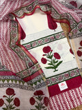 overhead flatlay, kurta panel centred with large red poppy placement print, green floral vine border strip, Chanderi dupatta with red chevron and floral border draped around