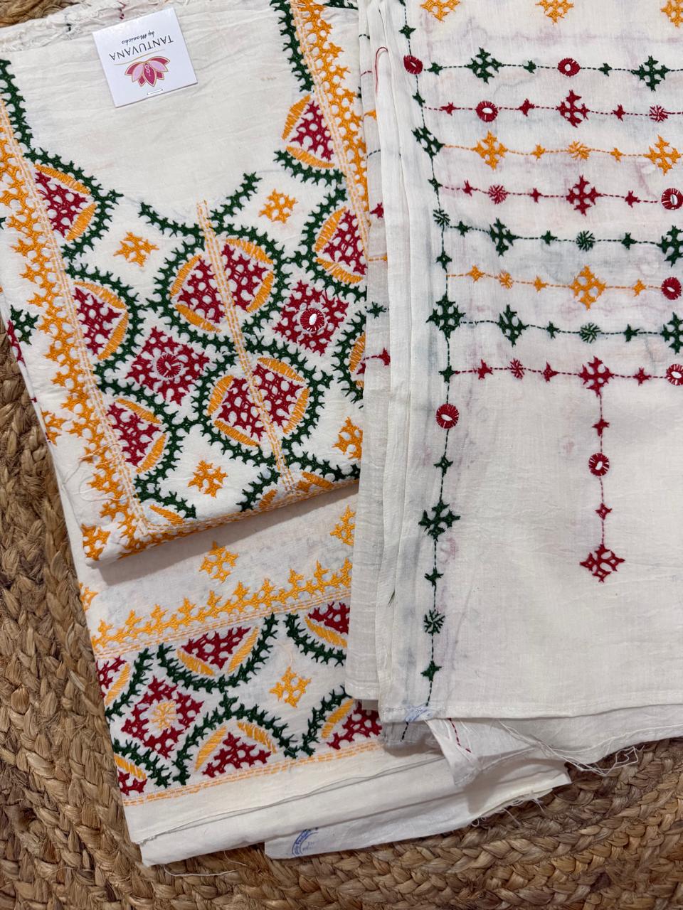 Cream multicolour Sindhi hand-embroidered unstitched suit set on mannequin – geometric diamond neckline panel with mirror work, scattered butti kurta body and all-over butti dupatta with geometric border