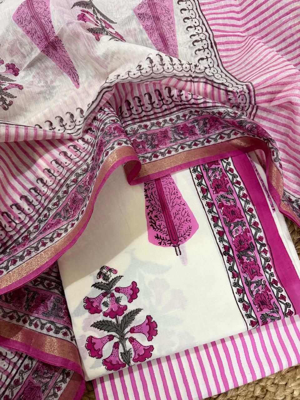 Cream & Pink Floral Block Print Cotton Unstitched Suit Set Flat Lay – Pink Stripe Bottom & Chanderi Silk Dupatta with Gold Zari Border