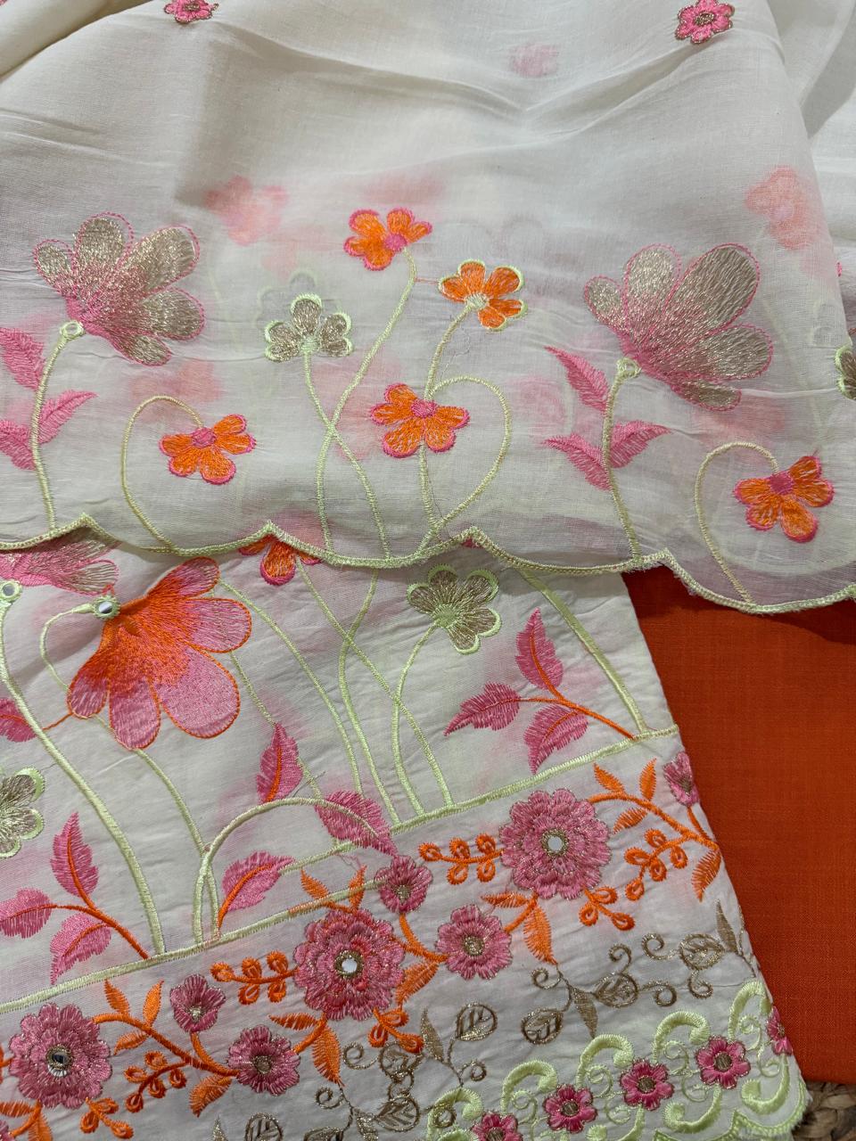 Cream Cotton Kameez & Dupatta Close-Up – Orange & Pink Floral Garden Embroidery with Scallop Border & Orange Bottom Detail