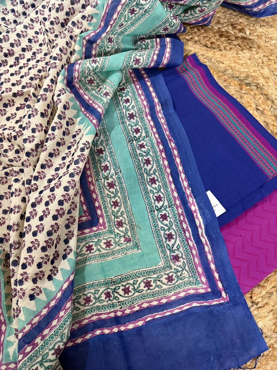 Angled Flat Lay – White Floral Print Kurta, Royal Blue Handloom Kurta & Teal Chanderi Silk Dupatta with Floral Paisley Border | House of Tantuvana