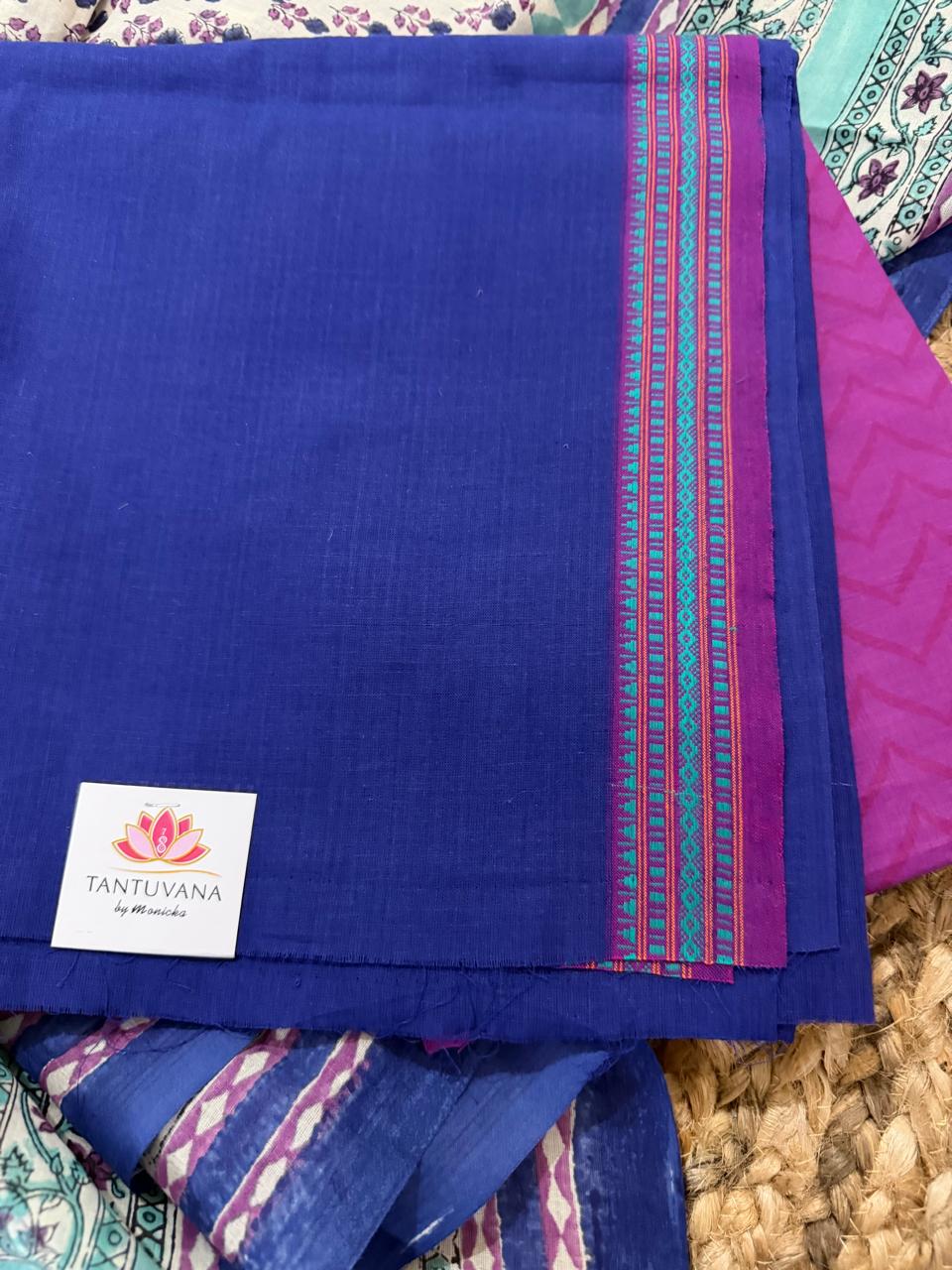 Close-Up of Royal Blue Handloom Cotton Kurta Fabric – Multicolour Woven Border with Purple Salwar & Chanderi Dupatta | House of Tantuvana