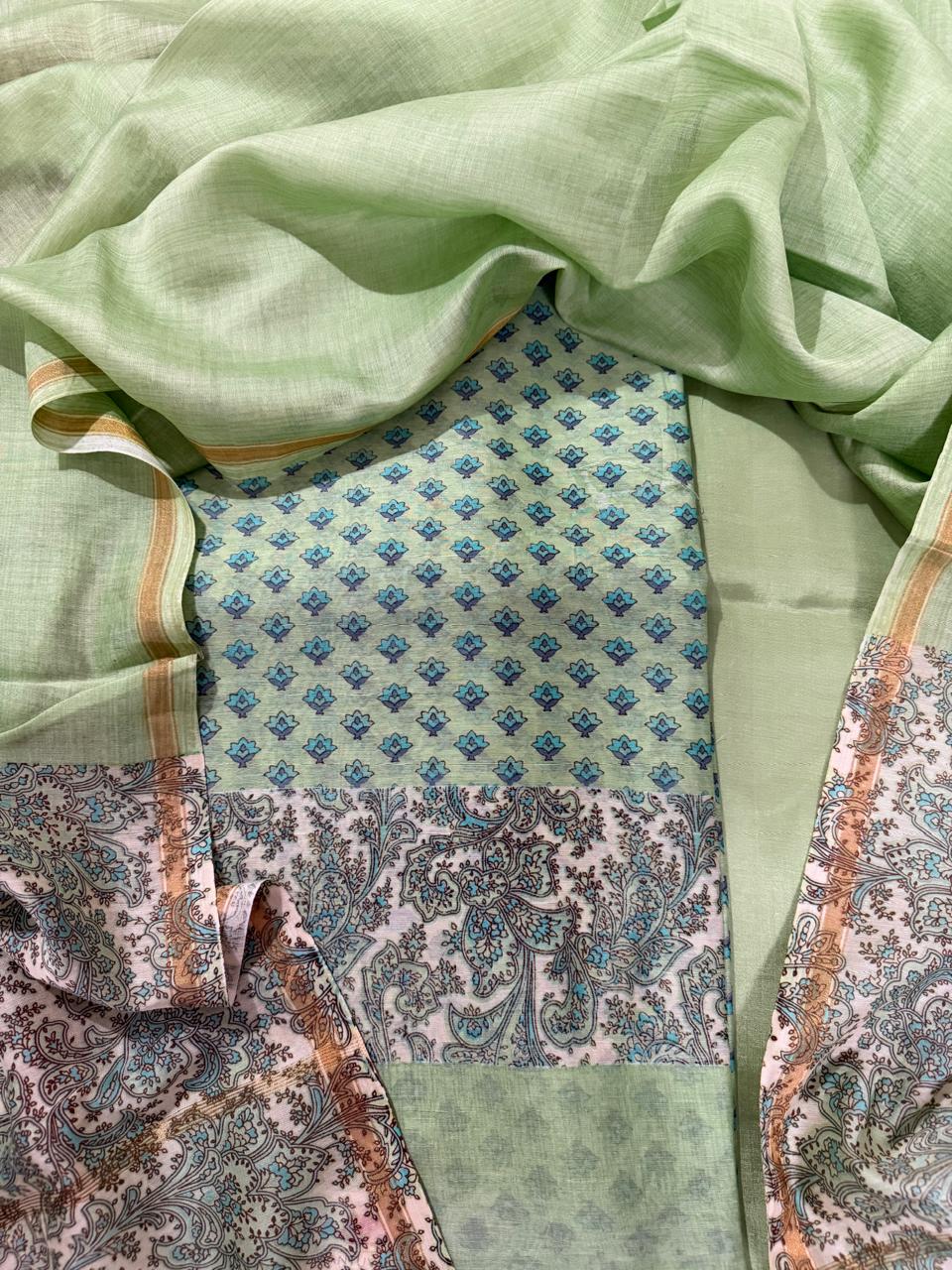 Overhead Flat Lay of Sage Green Chanderi Silk Suit Set – Booti Print Kurta Centre, Zari Border Dupatta & Paisley Fabric | House of Tantuvana