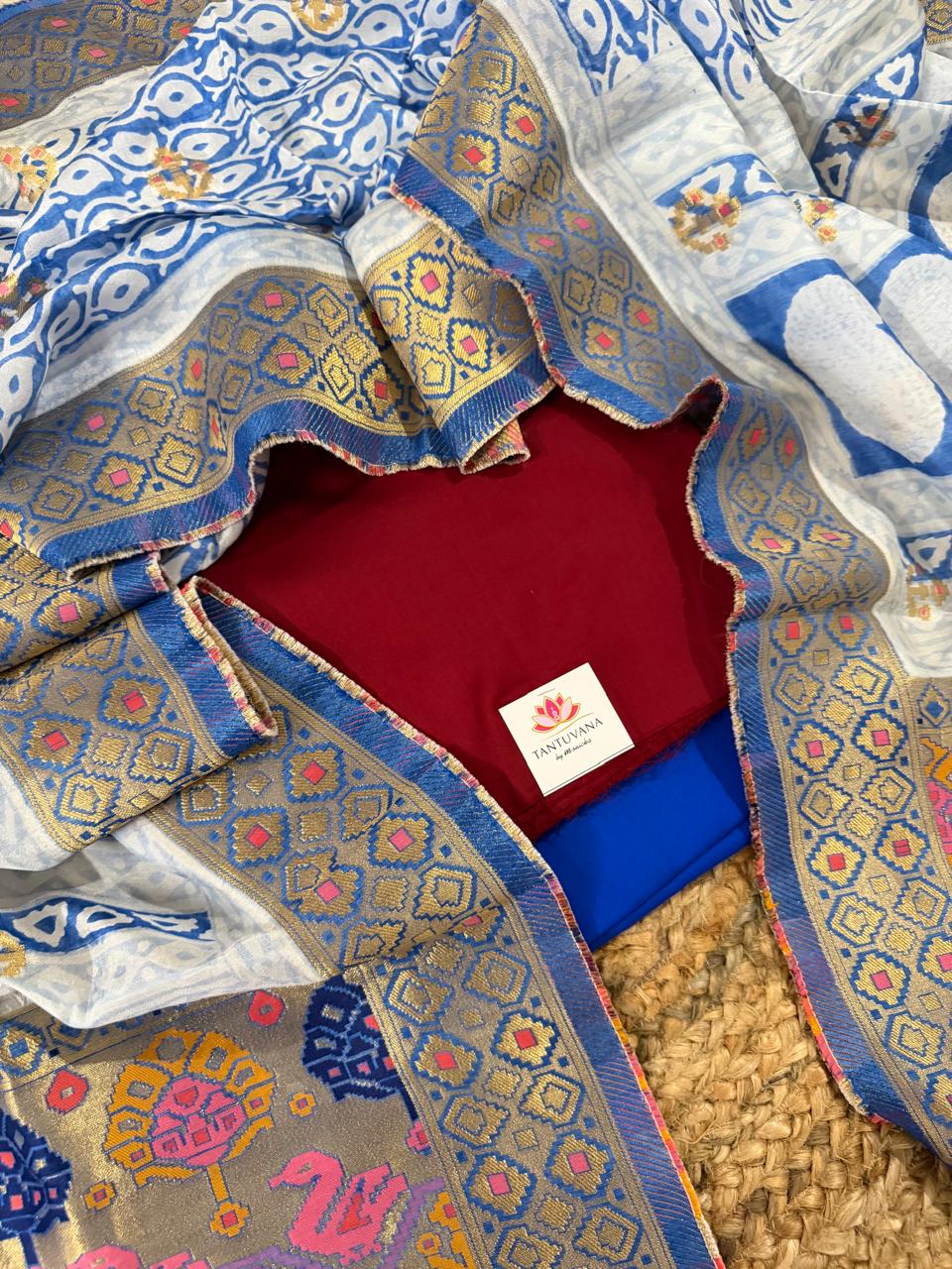 Maroon Glaze Cotton & Royal Blue Dola Silk 3-Piece Unstitched Suit Set – Kurta, Salwar & Dupatta Flat Lay | House of Tantuvana