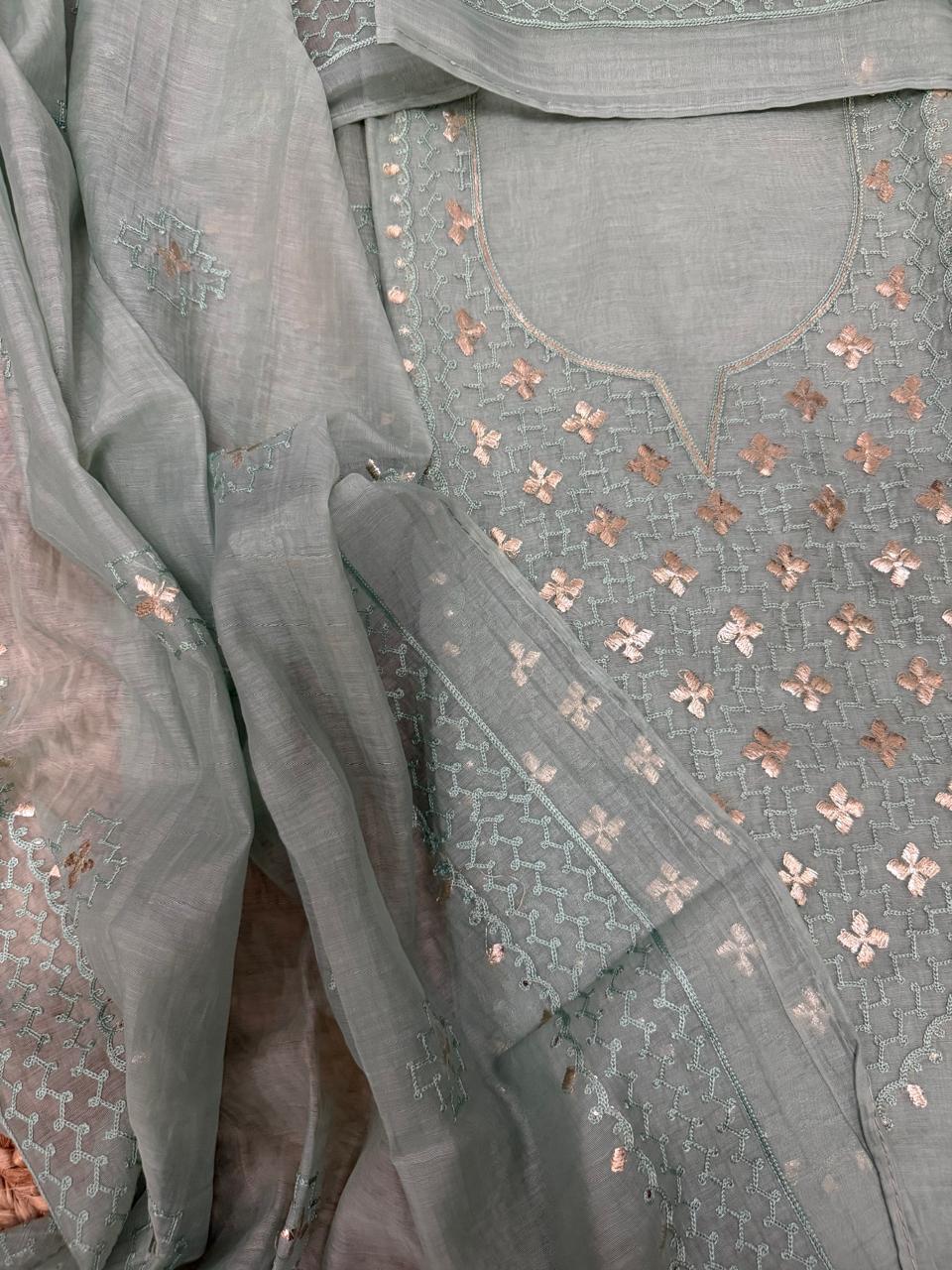 Powder green Chanderi silk kurta fabric – close-up of round neckline with dense gold pita work floral butti and silver sequin lattice embroidery