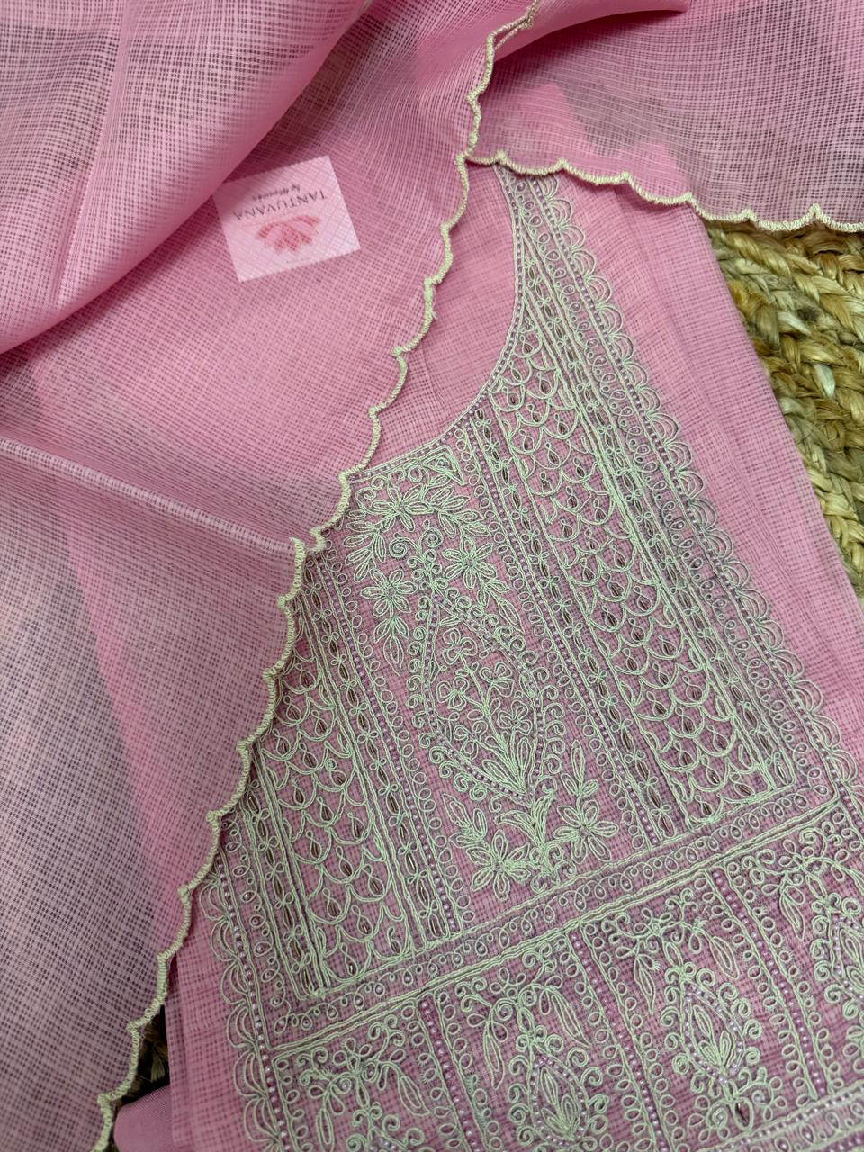Powder pink Kota kurta fabric – close-up of V-neckline with dense sage green dori hand embroidery floral jaal and scallop border
