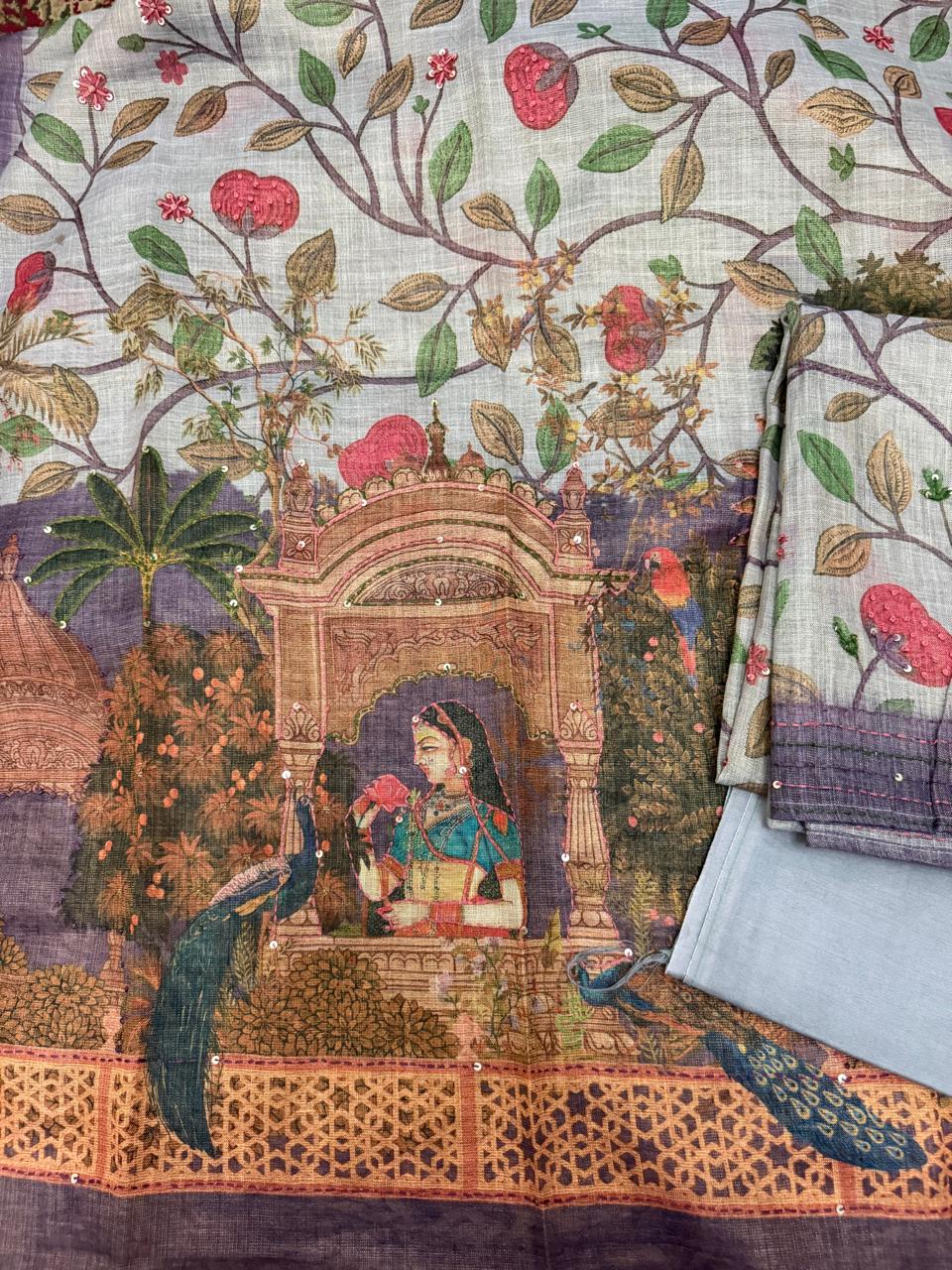 Grey gold Mughal print jute linen dupatta – flat lay close-up showing Mughal palace scene with royal lady, peacocks, pomegranate trees and parrots in multicolour digital print, gold lattice zari border, and powder blue folded bottom fabric