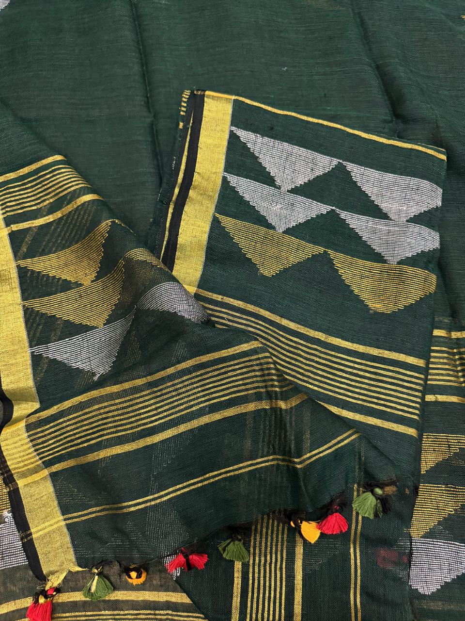 Deep green linen unstitched suit material with geometric Zari weave – close-up detail, Indian handloom kurta dupatta