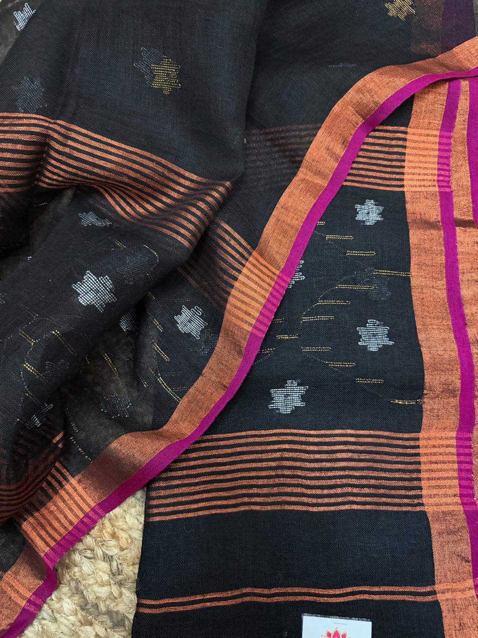 Midnight black linen Jamdani unstitched suit material – close-up of dual-tone metallic star weave, Indian handloom