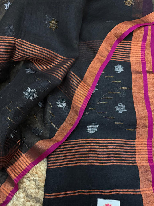 Midnight black linen Jamdani unstitched suit material – close-up of dual-tone metallic star weave, Indian handloom